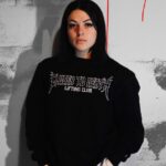 a) 'one of us' Premium Black Crewneck