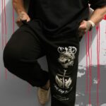a) 'one of us' Premium Black Jogger